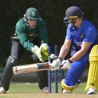 Volts batsman Shawn Hicks and Stags Wicketkeeper Ma'ara Ave watch as the ball flies onto the...