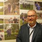 Mataura Valley Milk chief executive Bernard May with photos of farmers/shareholders in the...