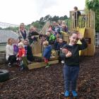  Archie Thor­burn (3) and other Macandrew Bay Playcentre children and parents enjoy the new...