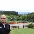 Mt Aspiring Rd resident Barry Bruce is unhappy about the construction of an 11m cellphone tower...