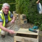 Helping construct little blue penguin nesting boxes is one of 20 events comprising the Forest ...