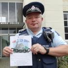 Sergeant Tony Woodbridge, of Oamaru, with the information being delivered to addresses in Oamaru...