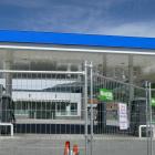 Fencing has been erected around the now-empty Mobil Queenstown site. Photo: Daisy Hudson