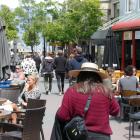 Diners enjoy the atmosphere in Mall St in Queenstown yesterday. Photo: Joshua Walton