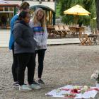 Mourners pay their respects to Grace Millane at a memorial in her honour at Queenstown's...