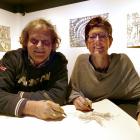 Luigi and Kate Agnelli work on their art in the exhibition space at Lakes District Museum. Photo:...