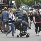 Thousands of bargain hunters were out in force in Dunedin yesterday. Photo: Gerard O'Brien