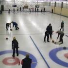 Two curling matches are played on the Maniototo indoor rink at Naseby. Image from ODT files.