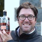Greg Ramsay, owner of the New Zealand Whisky Co, with a bottle of Dunedin Doublewood 18-year-old,...