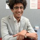 Red Cross Otago youth co-ordinator Sakhr Munassar sits at his workplace. PHOTO: LINDA ROBERTSON