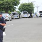 Armed police execute search warrants at a Hull St address in Oamaru earlier this month. Photo:...