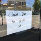 A sign at Alexandra's Westpac bank advises of closure this afternoon because of a power cut....