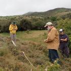 Clyde volunteer Bill Nagle (centre) takes part in a citizen science project near Clyde....