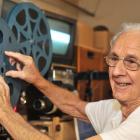 Film restorer Maurice Hayward digitizes old footage at his Opoho workshop. Photo: Christine O'Connor