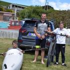 Kathmandu Coast to Coast bound Craig Lay prepares his gear with sons Rhys (8) trying out the...