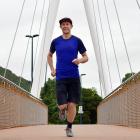 Kashi Leuchs runs over the bridge across the Leith last month in preparation for the Coast to...