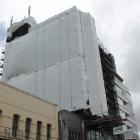 A new 24m mural remains covered at the Kelvin Hotel in Invercargill, after the unveiling was...