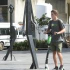 A Lime scooter is ridden through the University of Otago campus yesterday.