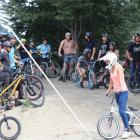 Riders from the Queenstown biking community wait to drop in at the Gorge Road Jump Park yesterday...