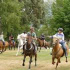 Riders compete in the relay race.