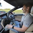 Rockertwerkz founder Dean Hall enjoys a handsfree moment in his Tesla. Photo: ODT files 