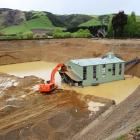 Waikaia Gold's 42m dredge, fed by an 85-tonne excavator, working at a depth of around 16m at the...