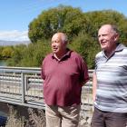 Inspecting the aging Albert Town bridge is (left) Albert Town resident Bruce Hebbard and Albert...