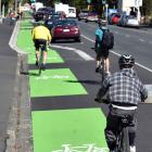 Cyclists use the new southbound cycleway on Cumberland St yesterday afternoon. PHOTO: PETER...