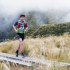 Dougal Allan competes in the mountain running stage of the 1 day individual competition during...