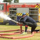 Oamaru firefighter Darryl Hansen shoots for the target in the monitor run at the Otago and...
