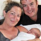Proud parents Brad and Hannah Barrow, of Wanaka, hold their happy and healthy baby boy Lincoln...