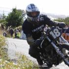 Kevin Ryan, of Greymouth, accelerates his 1966 Triumph MLC 800 up the hill in the Burt Munro...