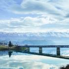 Slowing growth in global tourism; pictured, Maui camper vans owned by Tourism Holdings cross the...
