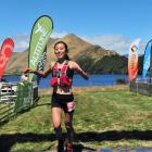 Queenstown athlete Nancy Jiang crosses the finish line to win the women's section of the Shotover...