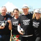 Soaking up the sun and atmosphere at the Cheers to Beers and Wine Festival at Oamaru Harbour on...