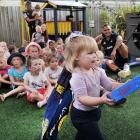 Highlanders halfback Aaron Smith watches the distribution skills of Lillie Porthouse (2) as she...