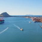 Total cargo volumes are up at Port of Tauranga, pictured, with a ninth crane ordered and 385m...
