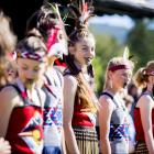 Arrowtown School kapa haka group member Eliana Collins (12) finds a light moment during the...