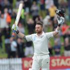 Brendon McCullum celebrates his triple century against India on the fifth day of the second test...