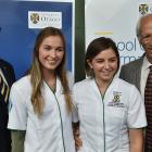 Australian father James McBrayer (left) passes on the family tradition to daughter Charlotte,...