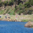 Take A Kid Fishing experience with young fisherfolk trying to catch the big one on the banks of...