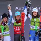 Second-placed Alice Robinson (L) on the podium with winner Mikaela Shiffrin (C) and third-placed...