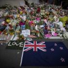 Flowers placed in tribute to the victims on a wall outside the Al Noor mosque in Christchurch....