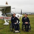 Handiflight pilots Alex Krol (left) and Eric Dabas in front of the German-built CTLS light sport...