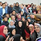 Prime Minister Jacinda Ardern poses for photographs with Dunedin Muslims inside the Al Huda...