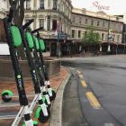Juicers earn $7 per scooter, with a cap of 10 at any one time before they can take go out and...