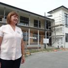 Observatory Village Lifecare general manager Rosie Dwyer stands outside its future two-storey, 10...