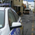 A police car at the scene in Cow Lane after the assault. Photo: Daisy Hudson