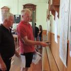 Noslam co-ordinator Rob McTague (left) and chairman Peter Mitchell discuss the map showing where...