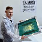 Artist Jay Hutchinson prepares for a 24-hour stint making T-shirts in a ‘‘sweatshop’’ he has...